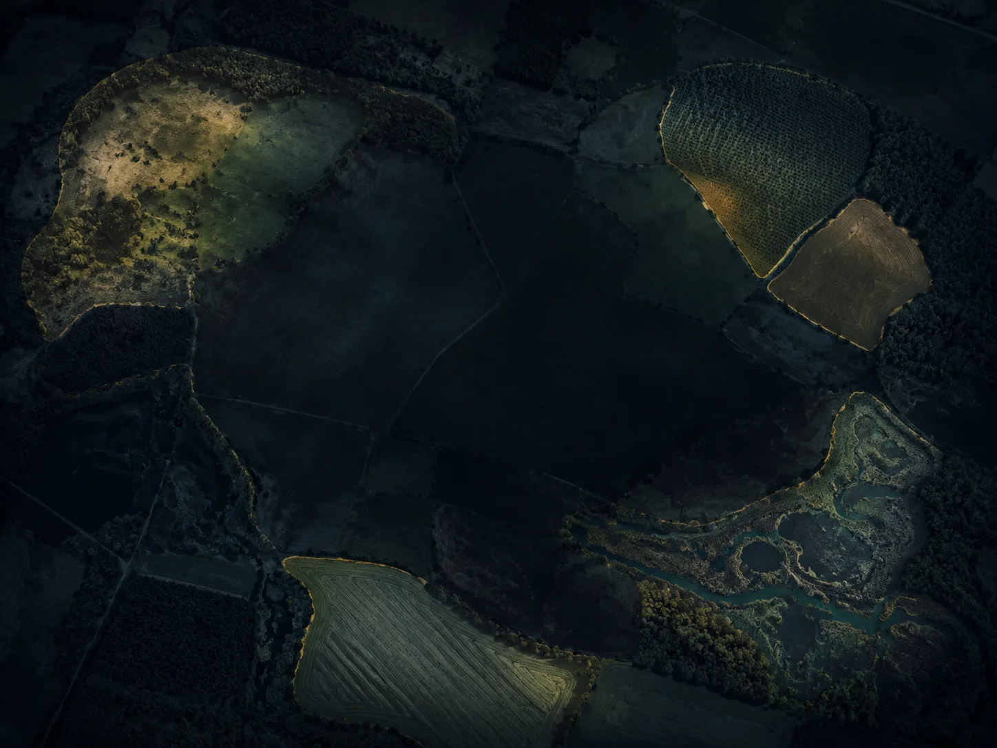 Aerial property mosaic with illuminated parcels